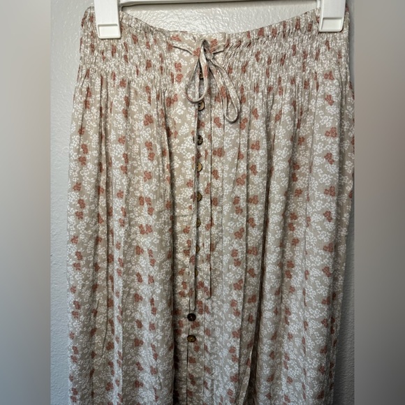 Promesa Sand Floral Smocked Waist Button High Low Maxi Skirt - Picture 9 of 12